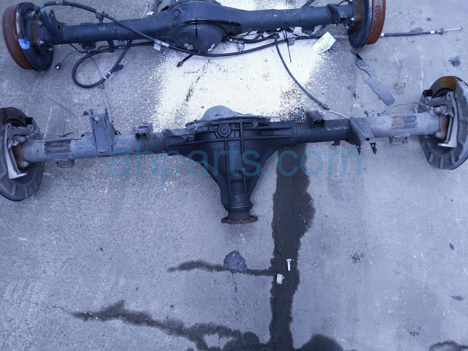 $499 Nissan REAR AXLE BEAM W/HUBS & DIFF