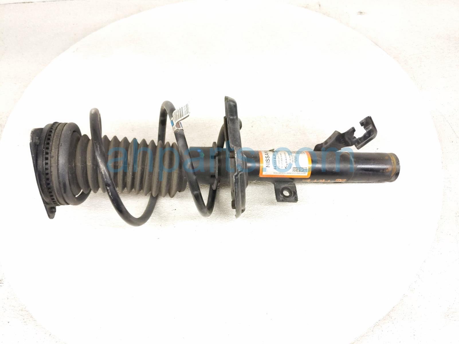 Nissan FR/LH STRUT ABSORBER + SPRING