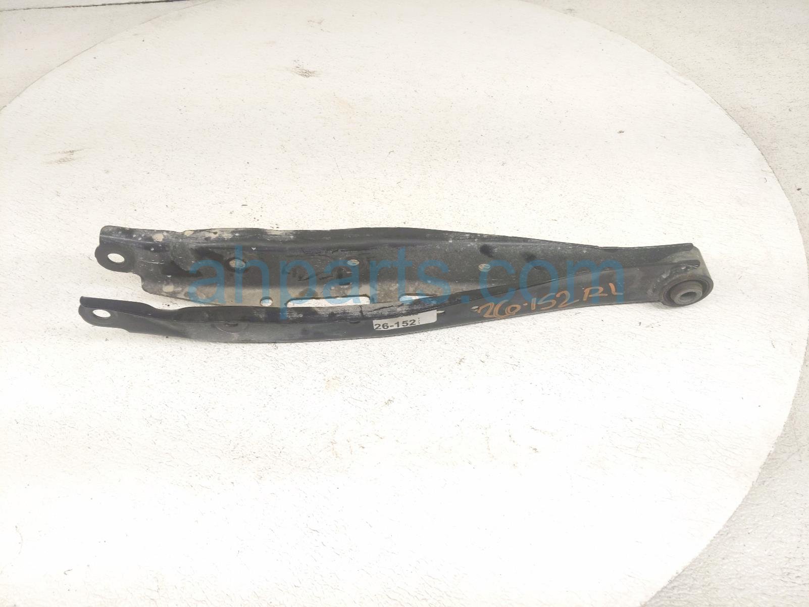 Subaru RR/LH STRUT MOUNT LOWER CONTROL ARM
