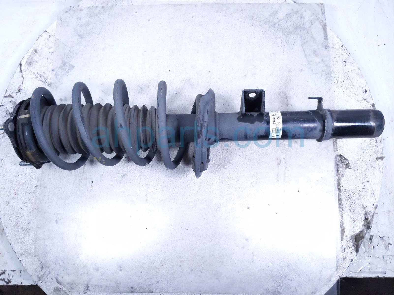 $125 Honda FR/LH STRUT ABSORBER + SPRING