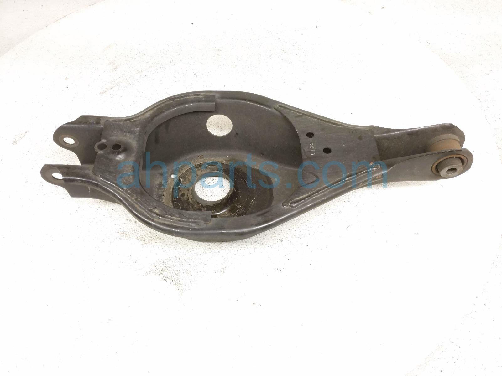 Nissan RR/RH SPRING SEAT LOWER CONTROL ARM