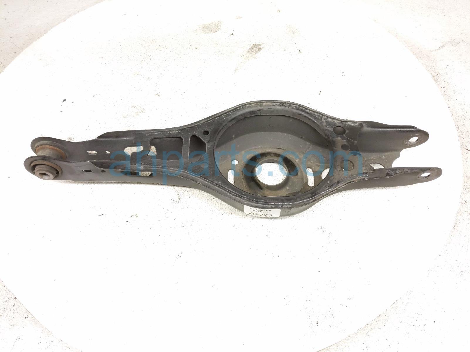 Rear driver SPRING MOUNT LOWER CONTROL ARM