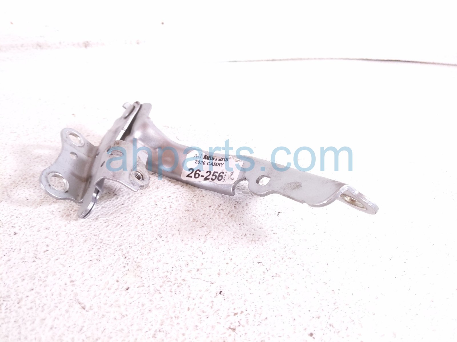 2026 Toyota Camry Passenger Hood Hinge Silver 53410 AQ020 Replacement 2026 Toyota Camry Passenger Hood Hinge Silver 53410 AQ020 Replacement thumbnail